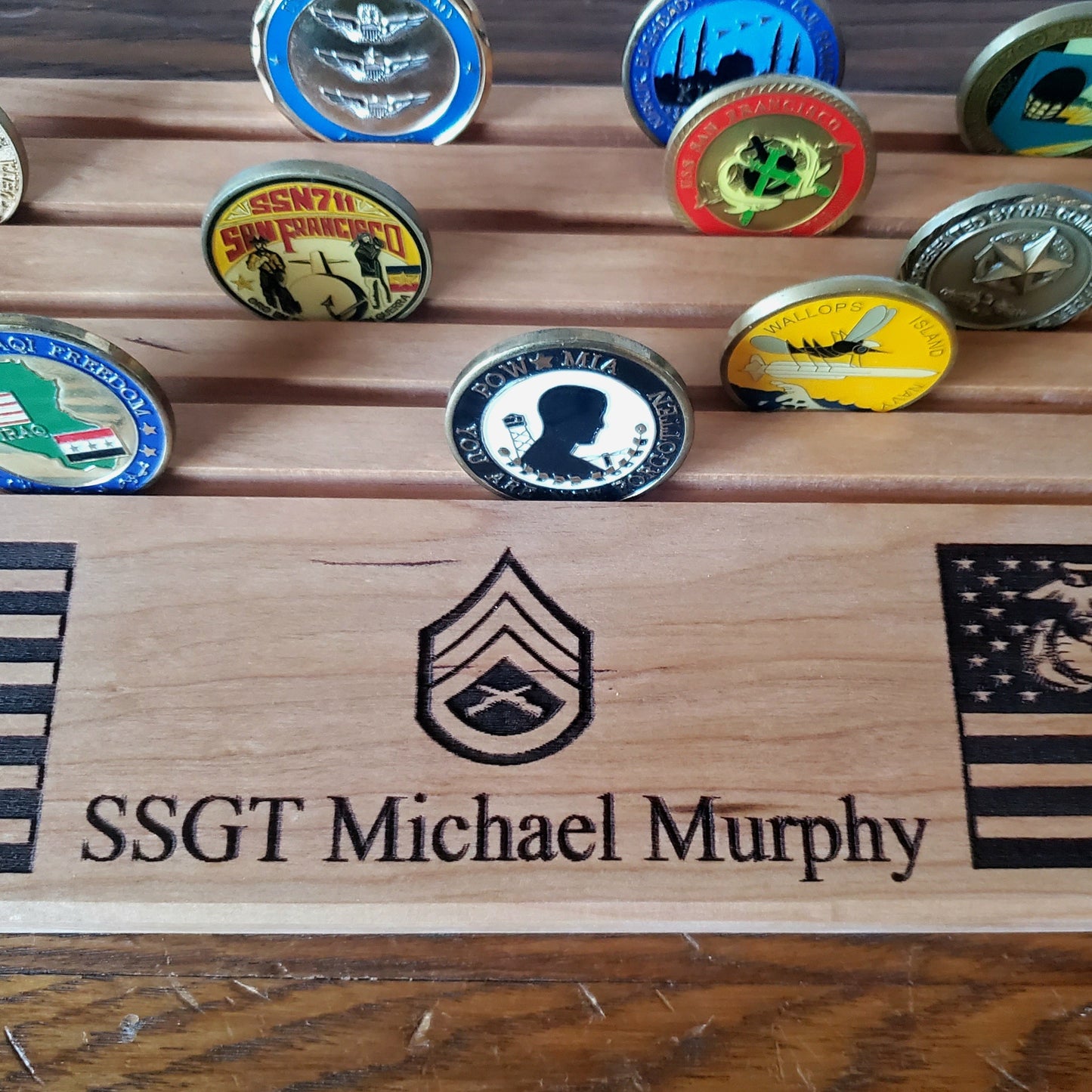 close up of engraved details of insignia and name of USMC challenge coin desk display
