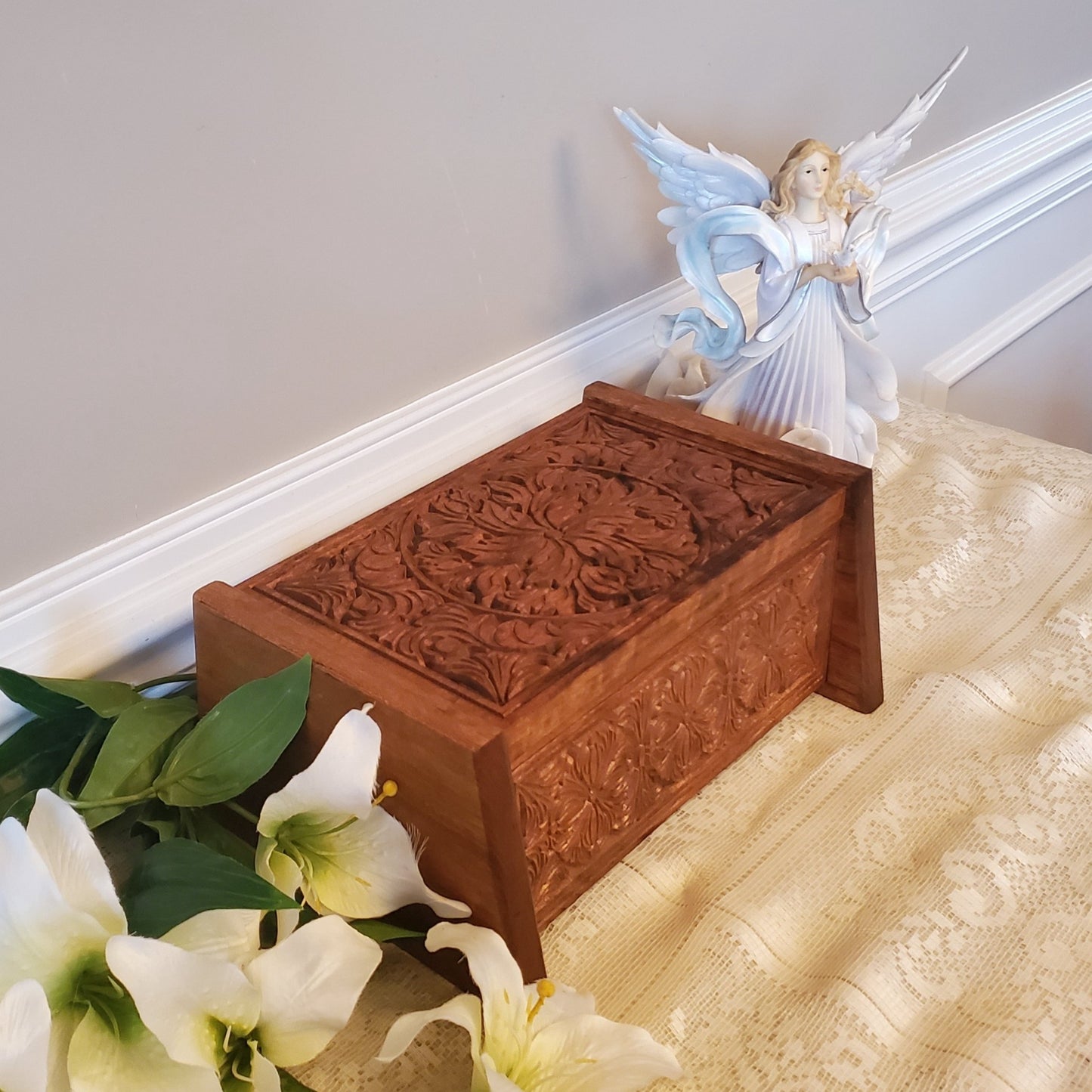 Handcrafted Solid Cherry Wood Cremation Urn Box showing detailed top carving
