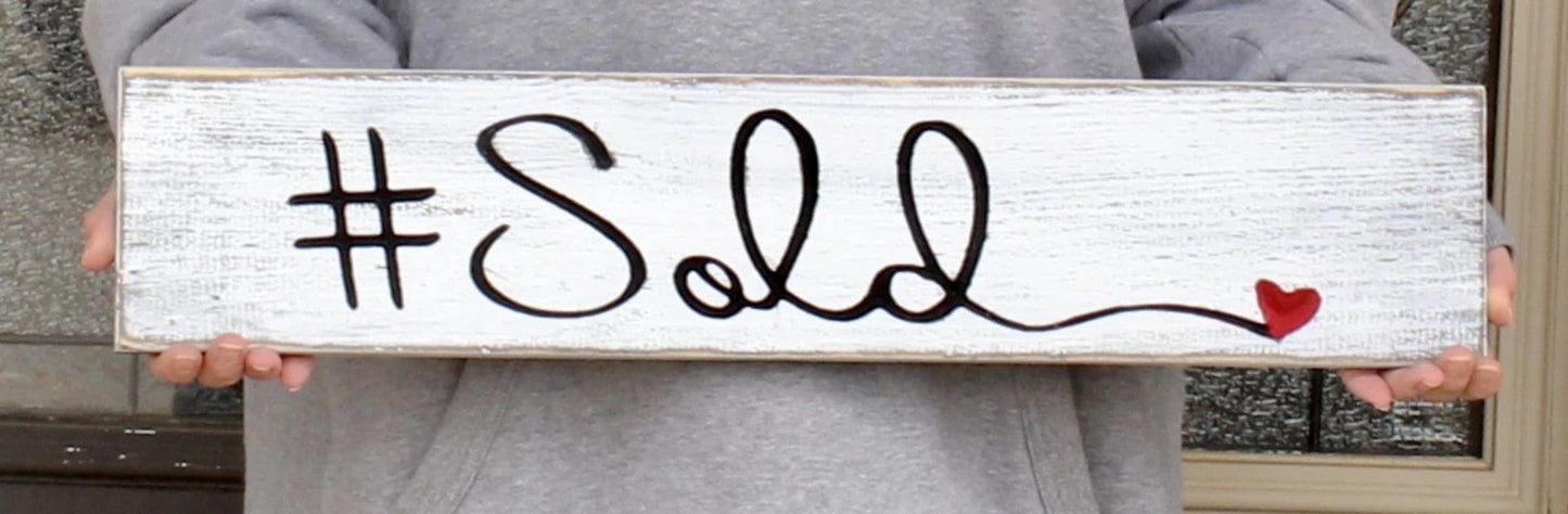 sold sign