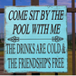 Come Sit by the Pool with Me the Drinks are Cold Friendship is Free