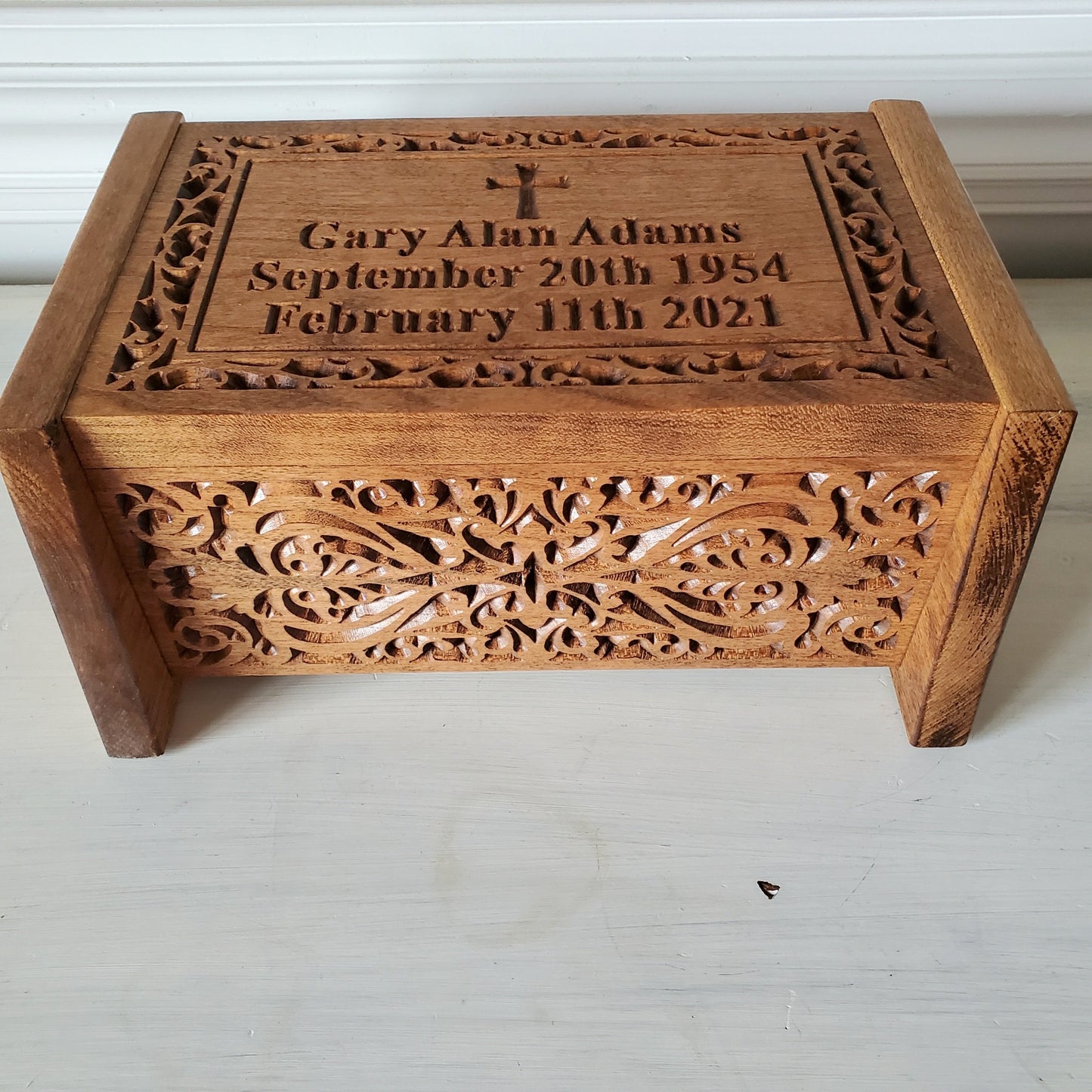 Religious wood container for remains