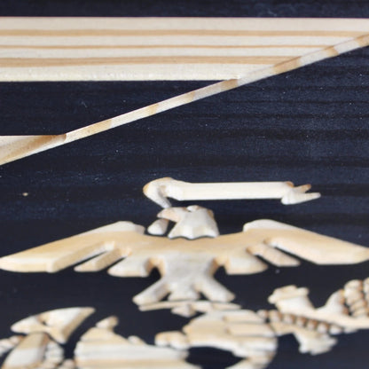 carved military wood flag