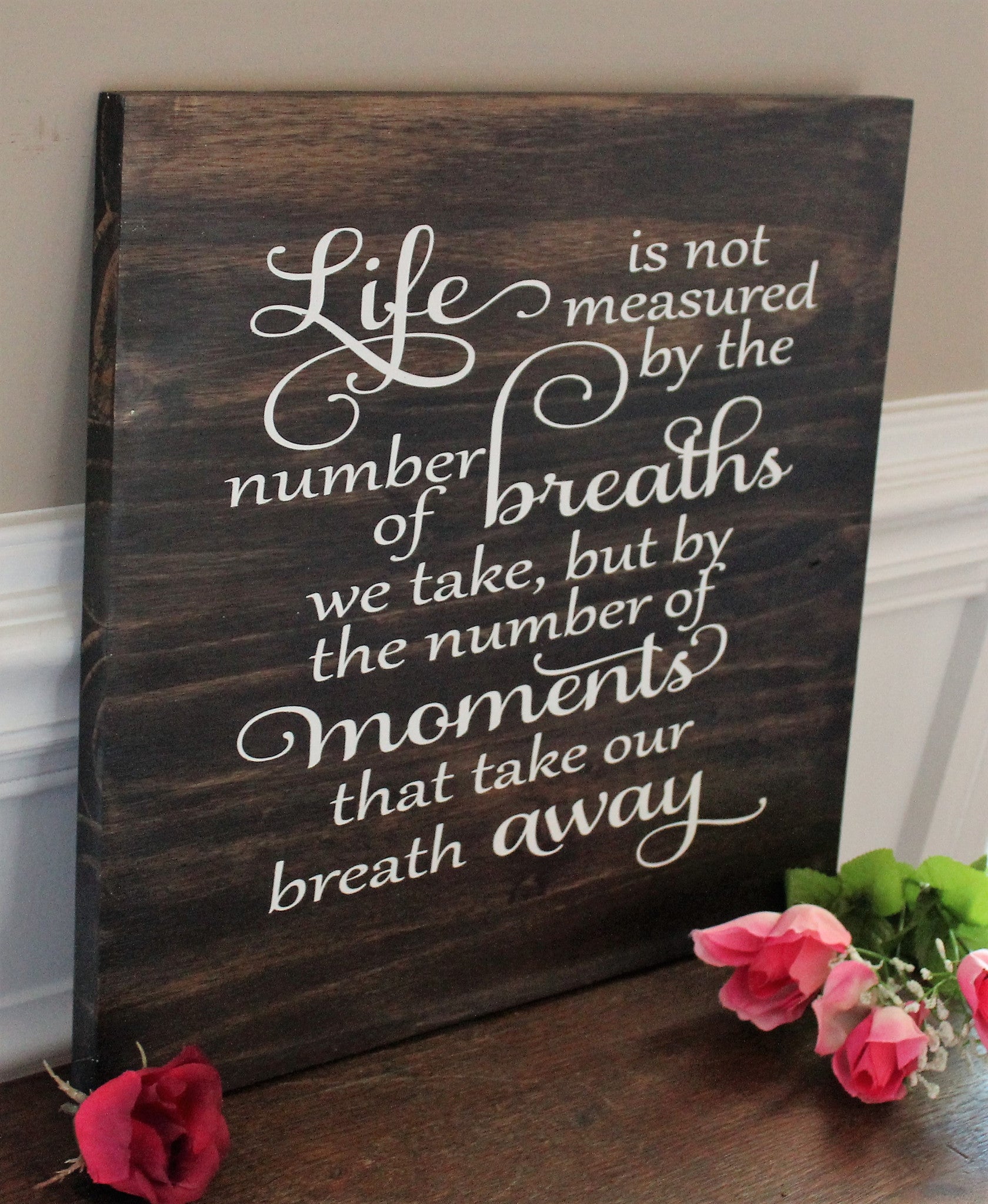 life is not measured by breaths wood sign
